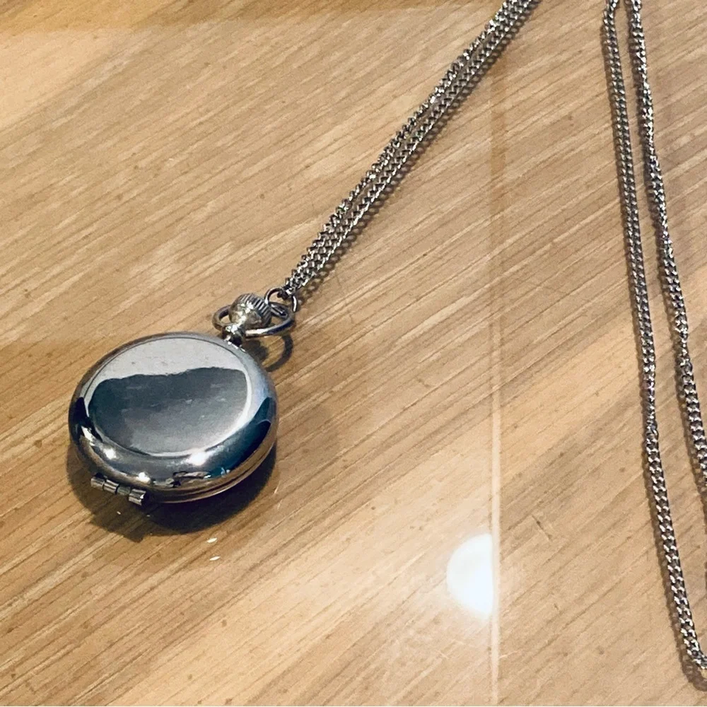 Estee Lauder pocket watch
